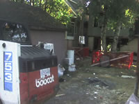 Excavation under house C & C Demolition Ltd.